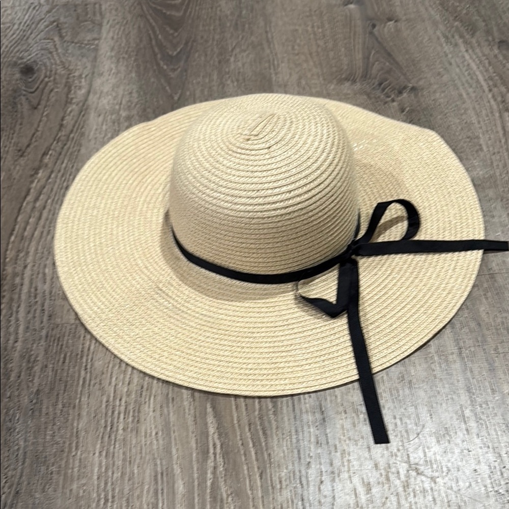 Elegant Tan Sun Hat with Black Ribbon